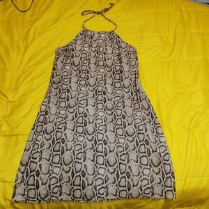 Junior or Women's Leopard print Dress XL straps around the Neck